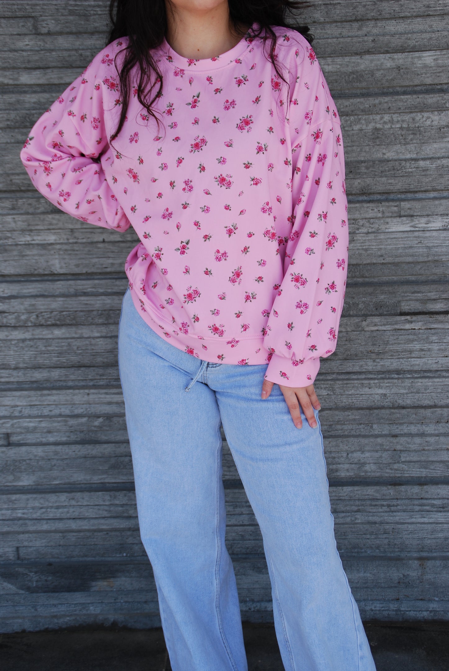 Rosa sweatshirt med blommigt mönster